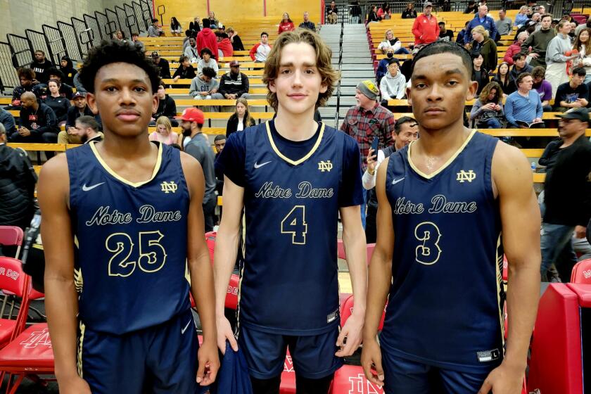 The Sherman Oaks Notre Dame trio of Mercy Miller (left), Dusty Stromer and Caleb Foster.