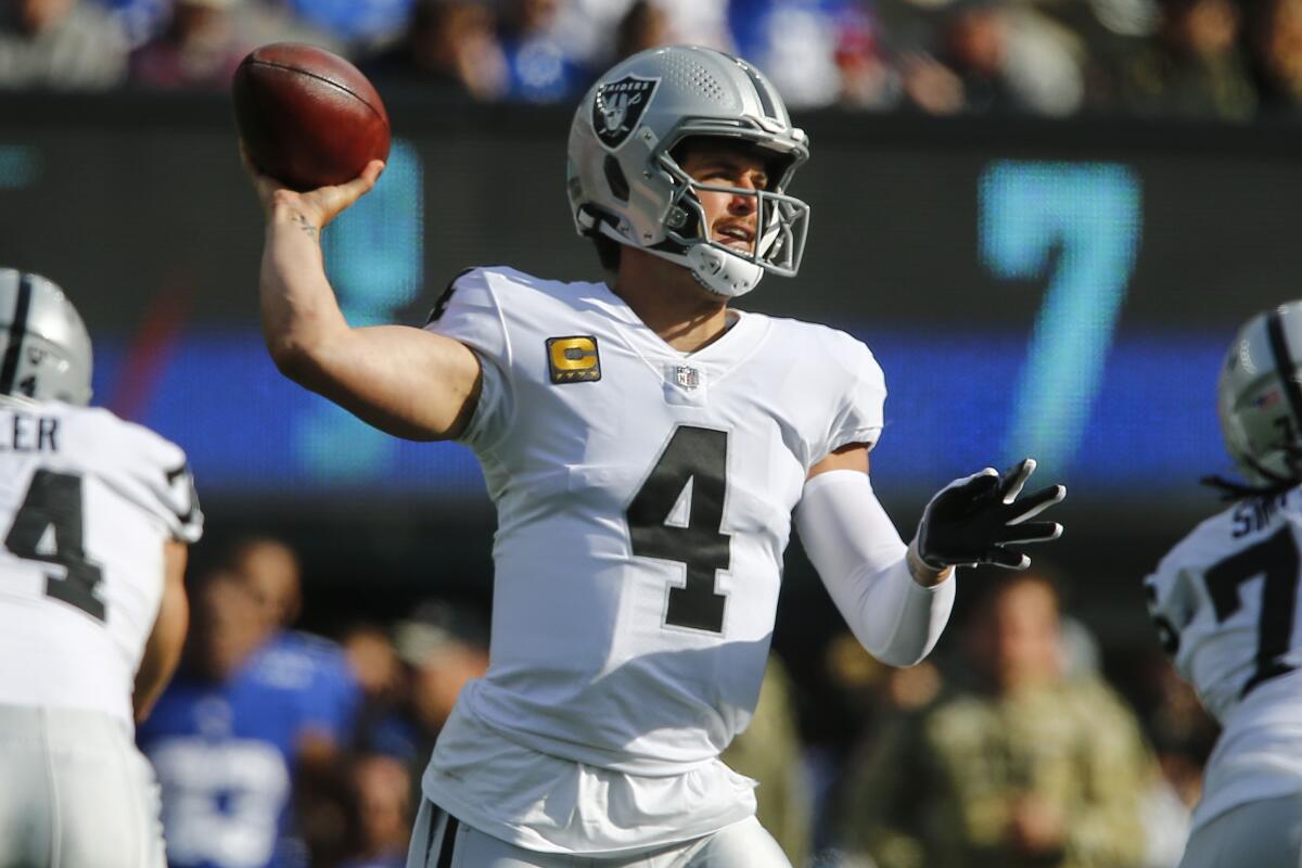 Las Vegas Raiders quarterback Derek Carr throws against the New York Giants on Sunday.
