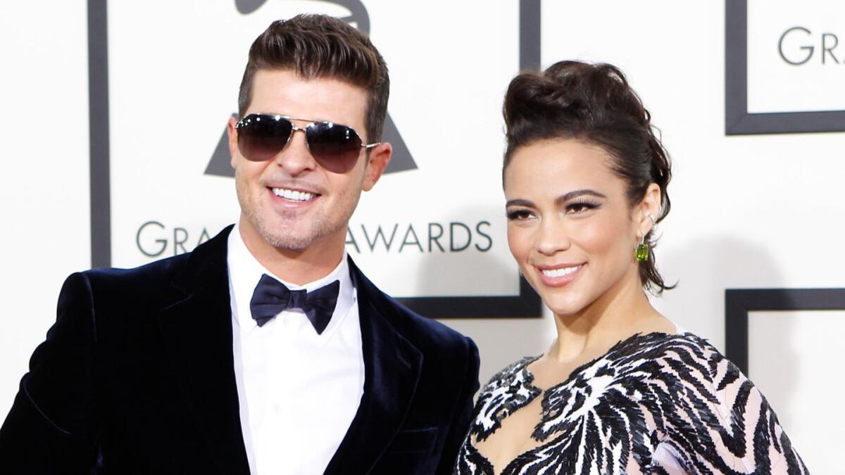 Robin Thicke and Paula Patton at the Grammy Awards in January 2014.