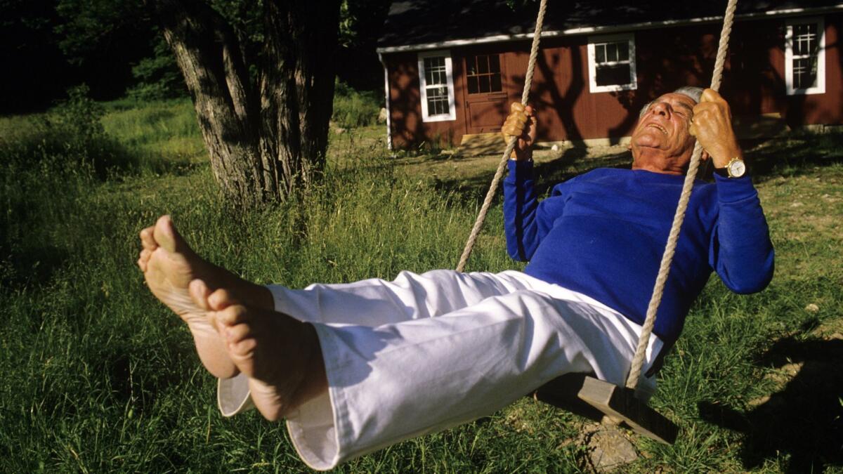 Bernstein, in 1986, swinging outside of his Connecticut home.
