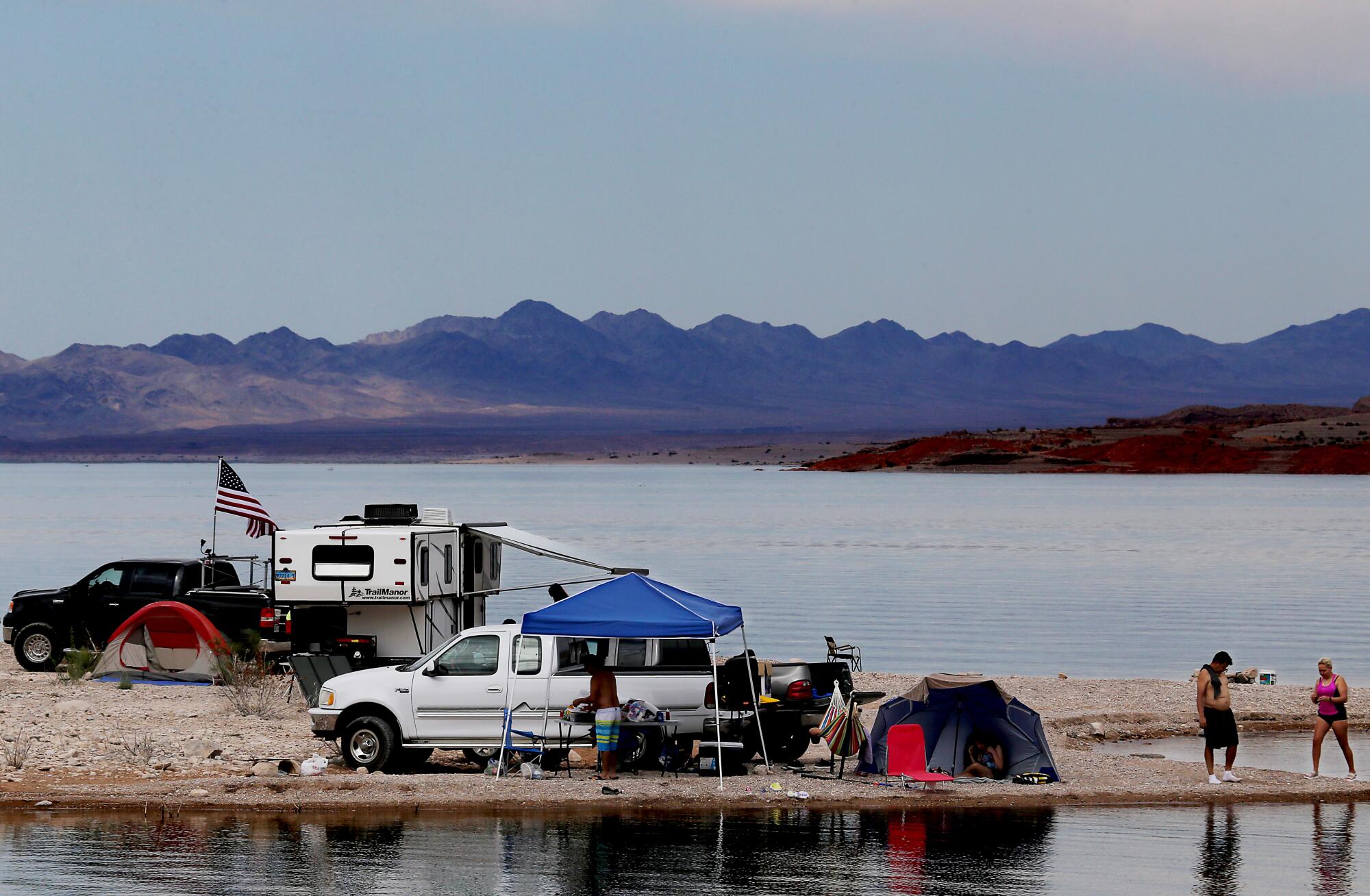 Campers set up on the shore of Lake Mead.
