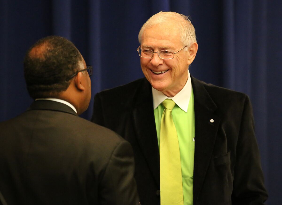 Ten potential candidates have filed paper to run for the seat being vacated by Los Angeles County Supervisor Michael D. Antonovich, seen in 2015 with Supervisor Mark Ridley-Thomas. Seven of the candidates fielded questions Wednesday at two public forums.
