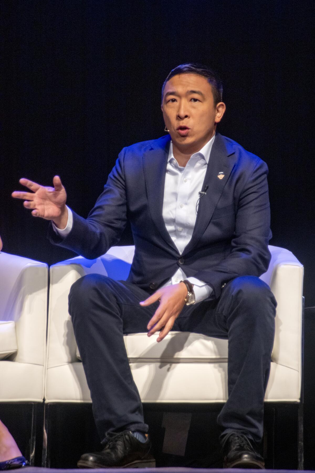 Candidate Andrew Yang speaks at Sunday's Democratic presidential forum at the Segerstrom Center for the Arts in Costa Mesa.