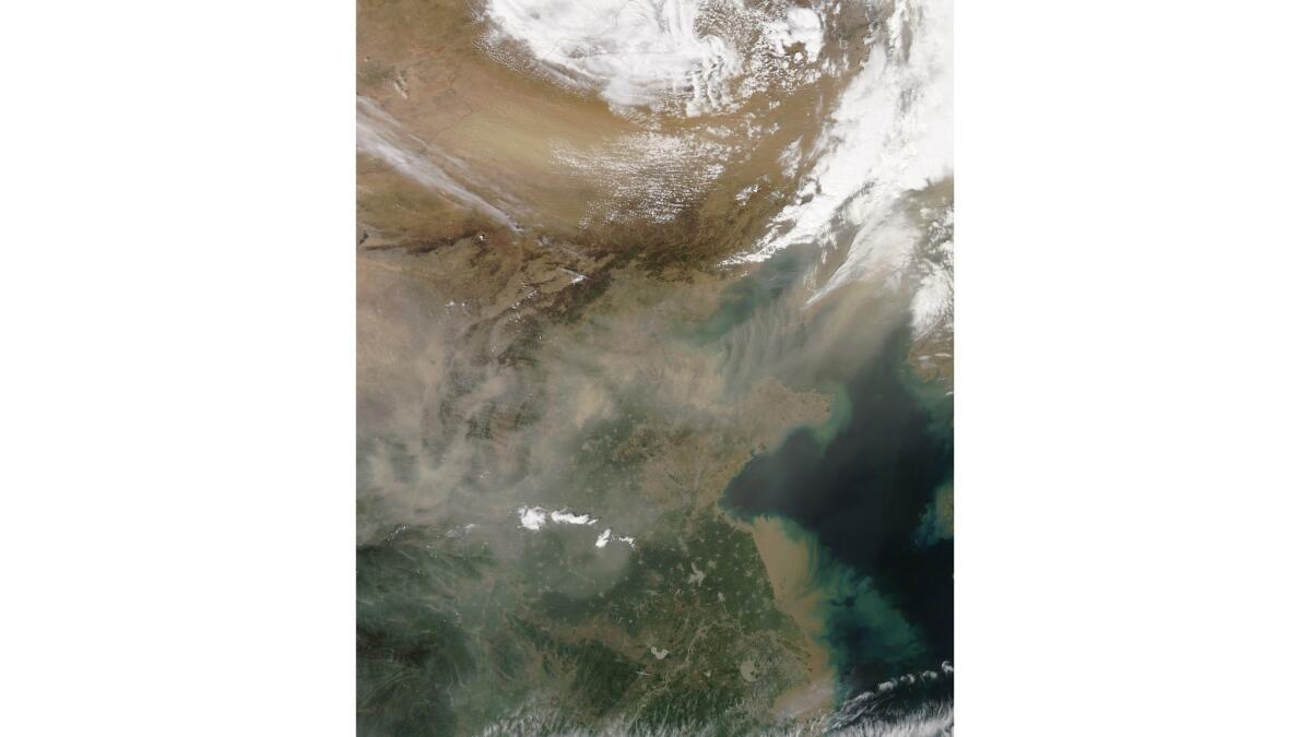 Dust plumes blow out of the Gobi Desert, with dust spreading over large swaths of eastern China and beyond on April 27, 2012. (NASA)