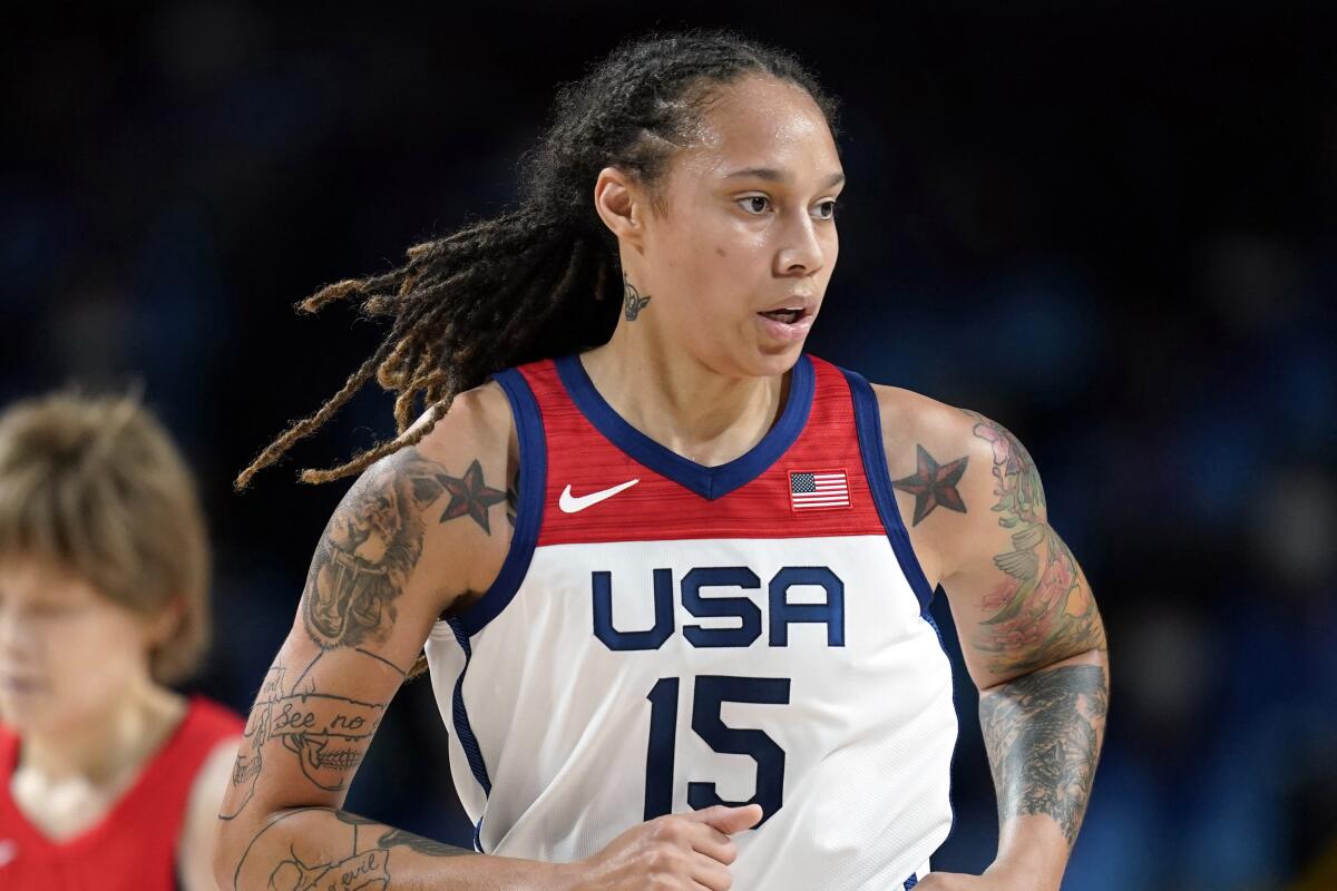 Brittney Griner runs on the court during the U.S. women's basketball gold medal game against Japan in the Tokyo Olympics.