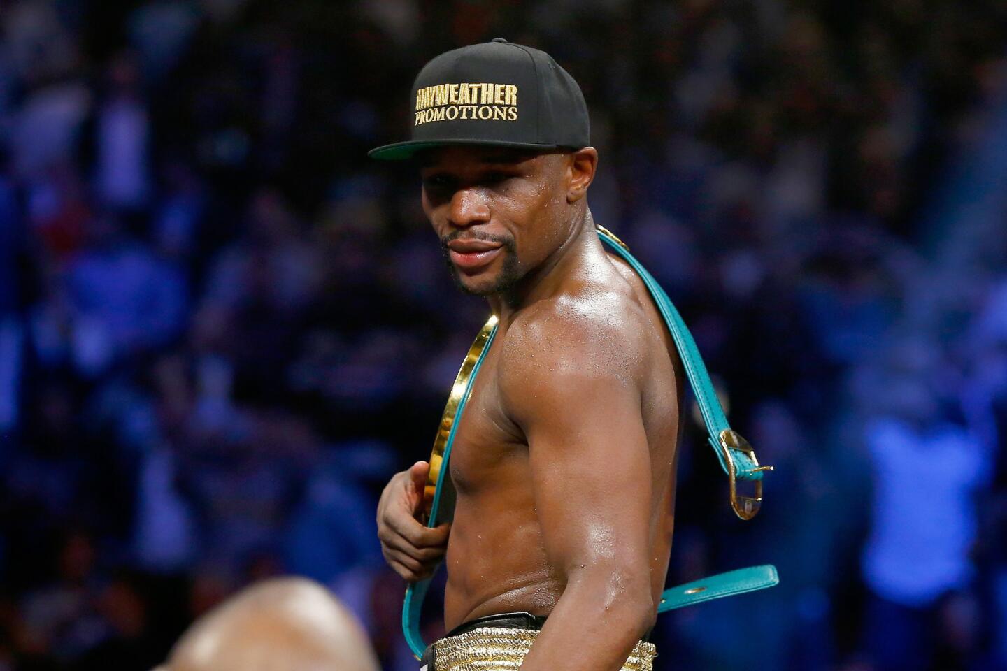 Floyd Mayweather Jr. with his belt.