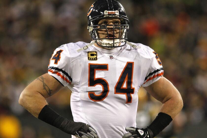 Former Chicago linebacker Brian Urlacher won't be joining the Vikings any time soon, Minnesota Coach Leslie Frazier said.