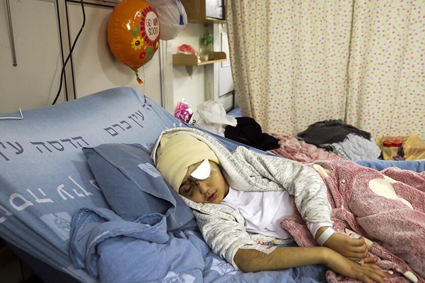 Malik Eissa, 9, at a Jerusalem hospital in February.