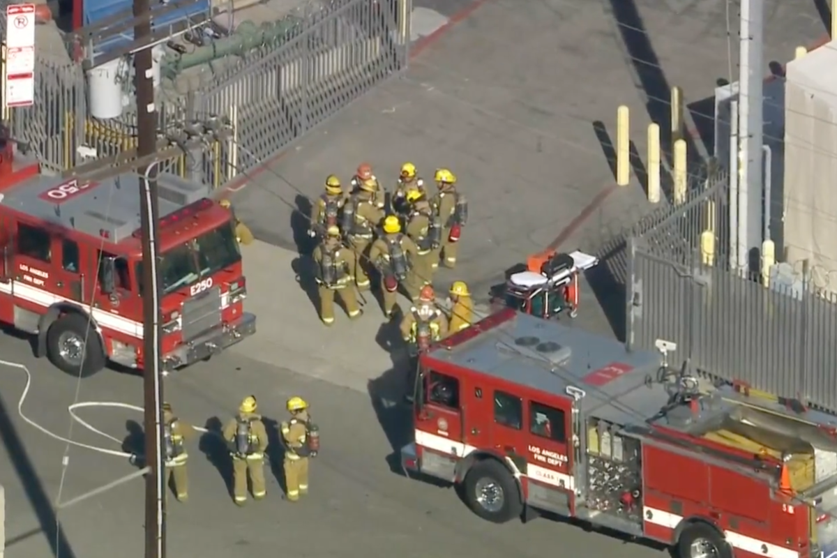 Firefighters huddle