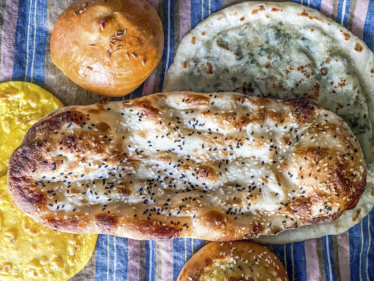 Barbari, center, and other Iranian breads.