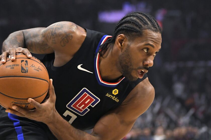 Los Angeles Clippers forward Kawhi Leonard moves toward the basket during the second half of an NBA basketball game against the Denver Nuggets Friday, Feb. 28, 2020, in Los Angeles. The Clippers won 132-103. (AP Photo/Mark J. Terrill)
