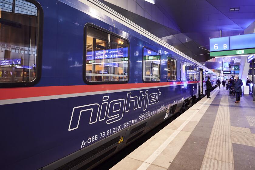 This image released by ÖBB shows a Nightjet sleeper train at a station in Vienna, Austria. A growing number of climate-conscious Europeans are giving up flying in favor of long-haul trains. (Marek Knopp/ÖBB via AP)