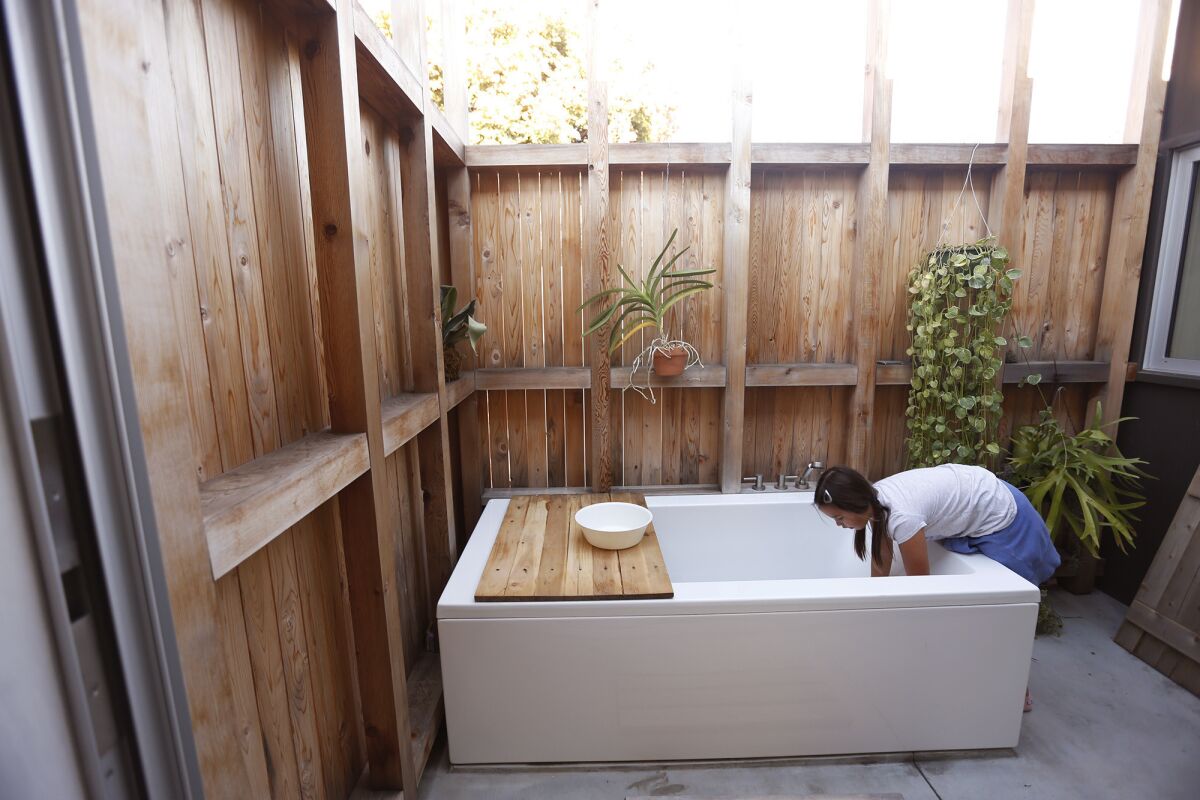 The new addition features an outdoor Japanese bathtub.