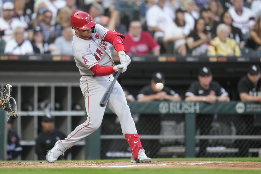 Los Angeles Angels' Brandon Drury swings into a three-run home run run off Chicago White Sox starting pitcher Michael Kopech during the first inning of a baseball game Monday, May 29, 2023, in Chicago. (AP Photo/Charles Rex Arbogast)