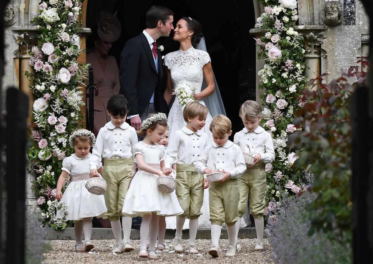 Princess Charlotte, left in front row, and Prince George, second from right, at Pippa Middleton's wedding.