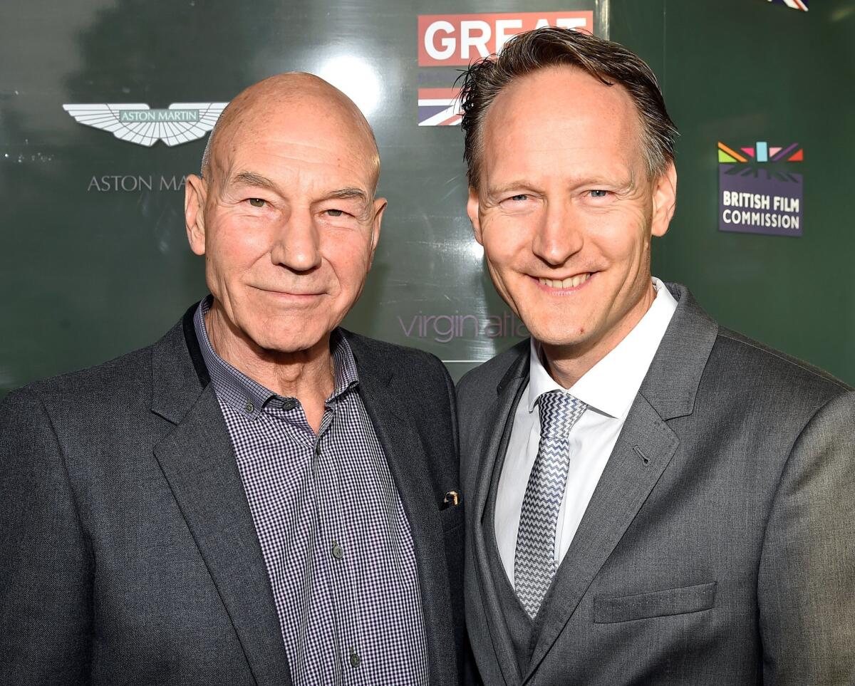 Actor Patrick Stewart, left, and British Consul General Chris O'Connor honor the British nominees of the 87th annual Academy Awards.