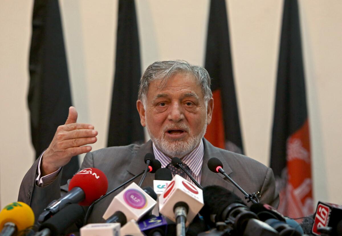 Ahmad Yousuf Nouristani, chairman of the Independent Election Commission, speaks at a news conference Monday in Kabul, Afghanistan.