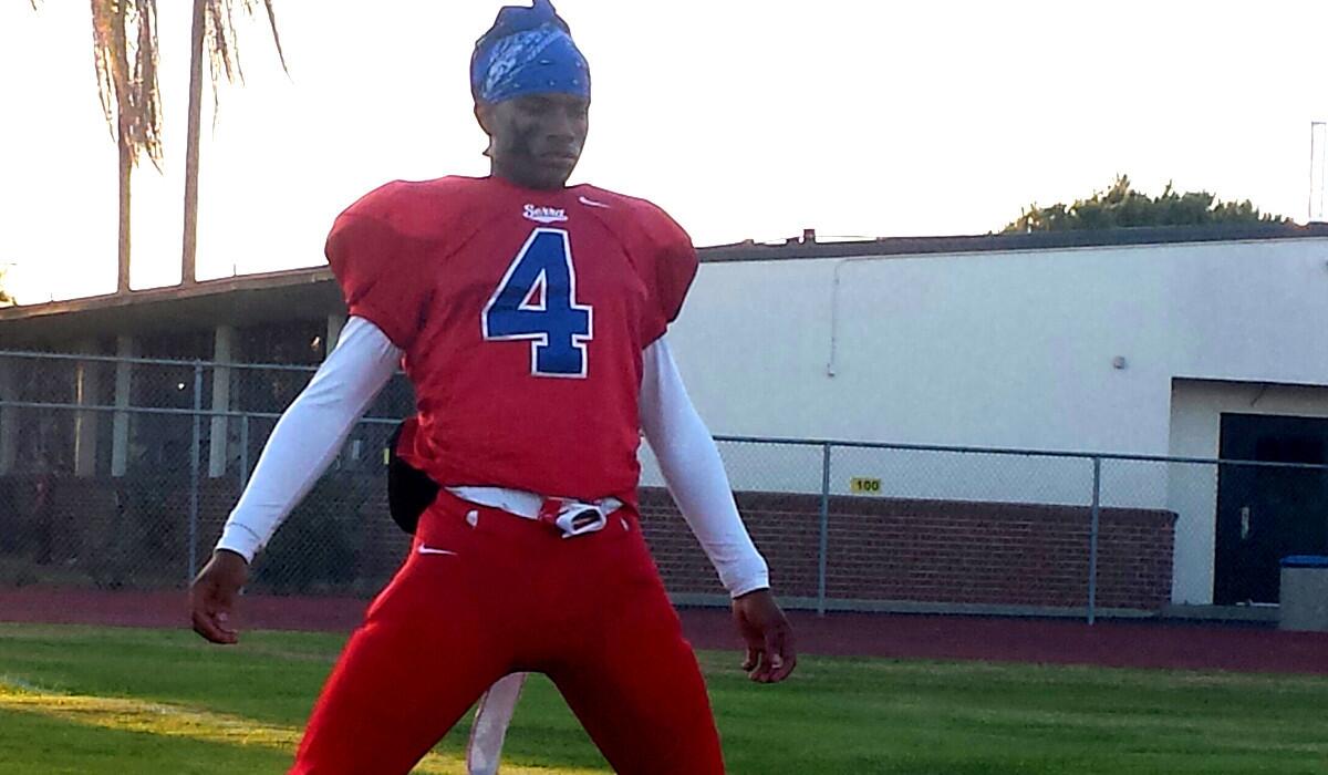 Gardena Serra star Stanley "Scrappy" Norman warms up for the Cavaliers' game against Notre Dame on Friday night.