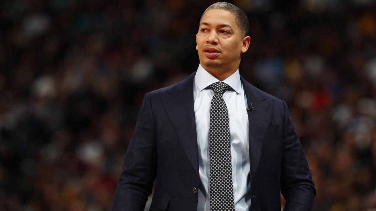 Tyronn Lue looks on during a game between the Cleveland Cavaliers and Denver Nuggets in March 2018.