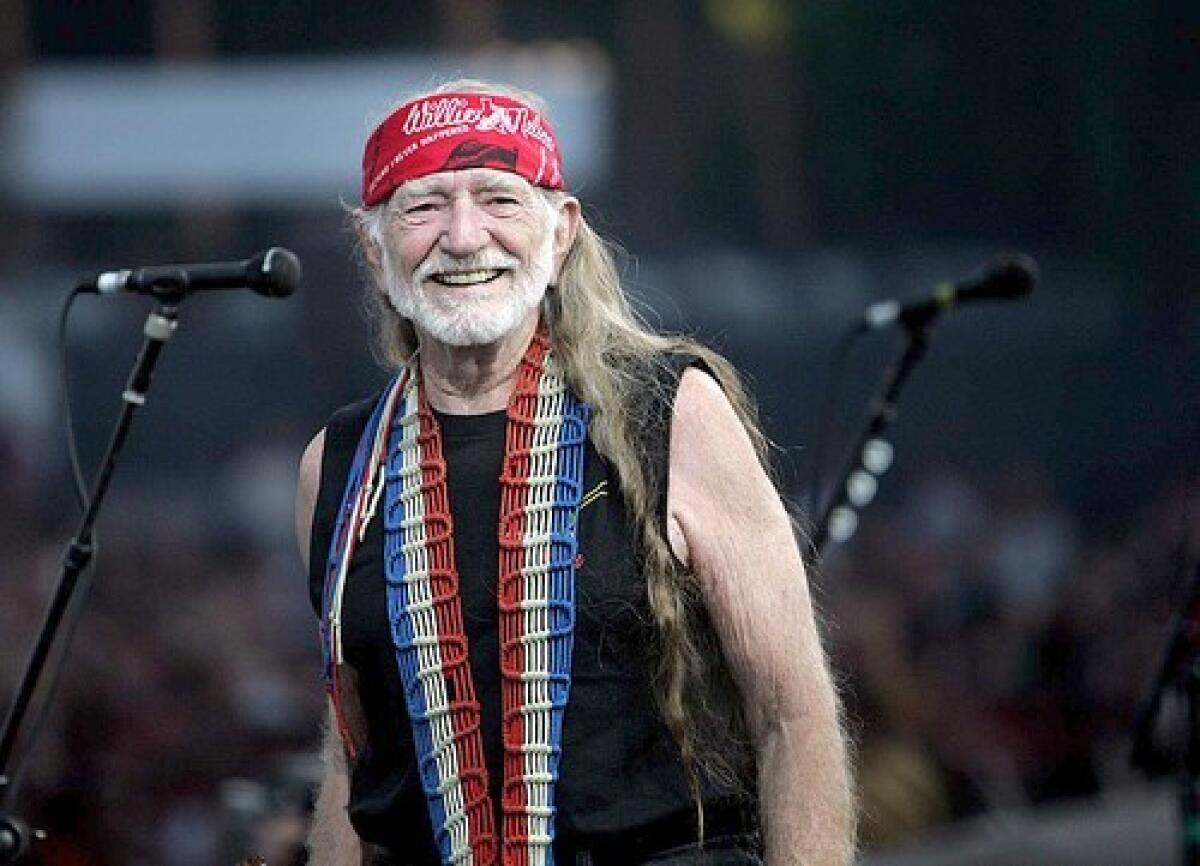 Willie Nelson finishes his Sunday afternoon performance.