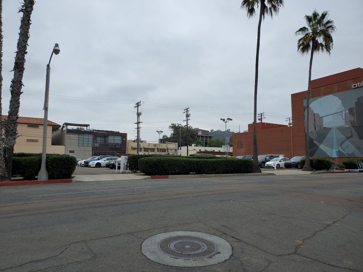A mixed-use development is planned for this parking lot on Herschel Avenue.