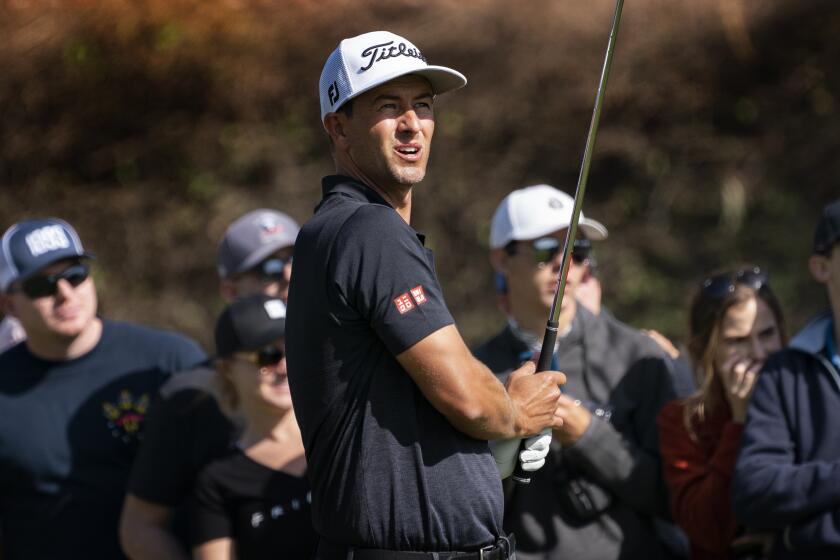 PACIFIC PALISADES, CA - FEBRUARY 15, 2020: Co-leader Adam Scott watches his tee shot at the par-3, 14th hole during Round 3 of the Genesis Open at Riviera Country Club on February 15, 2020 in Pacific Palisades, California. He is tied for the lead at 10 under par.