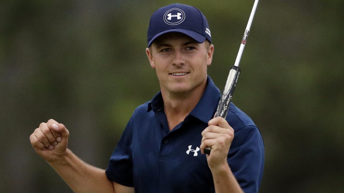 Jordan Spieth celebrates after winning the Masters at Augusta National Golf Club on April 12, 2015.