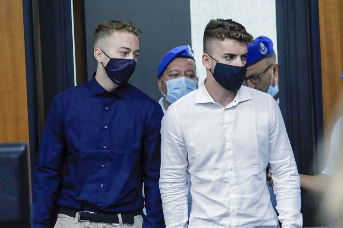 Finnegan Lee Elder, left, and Gabriel Natale-Hjorth arrive for a court hearing in Rome on Wednesday.