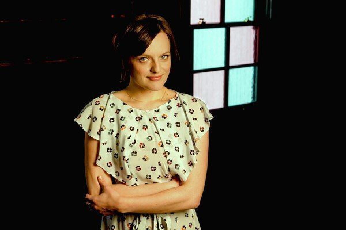 Actress Elisabeth Moss is photographed inside the Pikey on Sunset Boulevard in Los Angeles.
