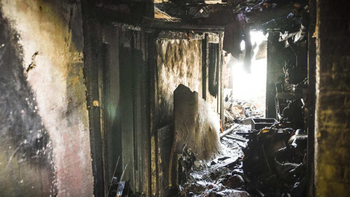 Debris inside a warehouse where a fire killed at least 36 people during a club-style party.