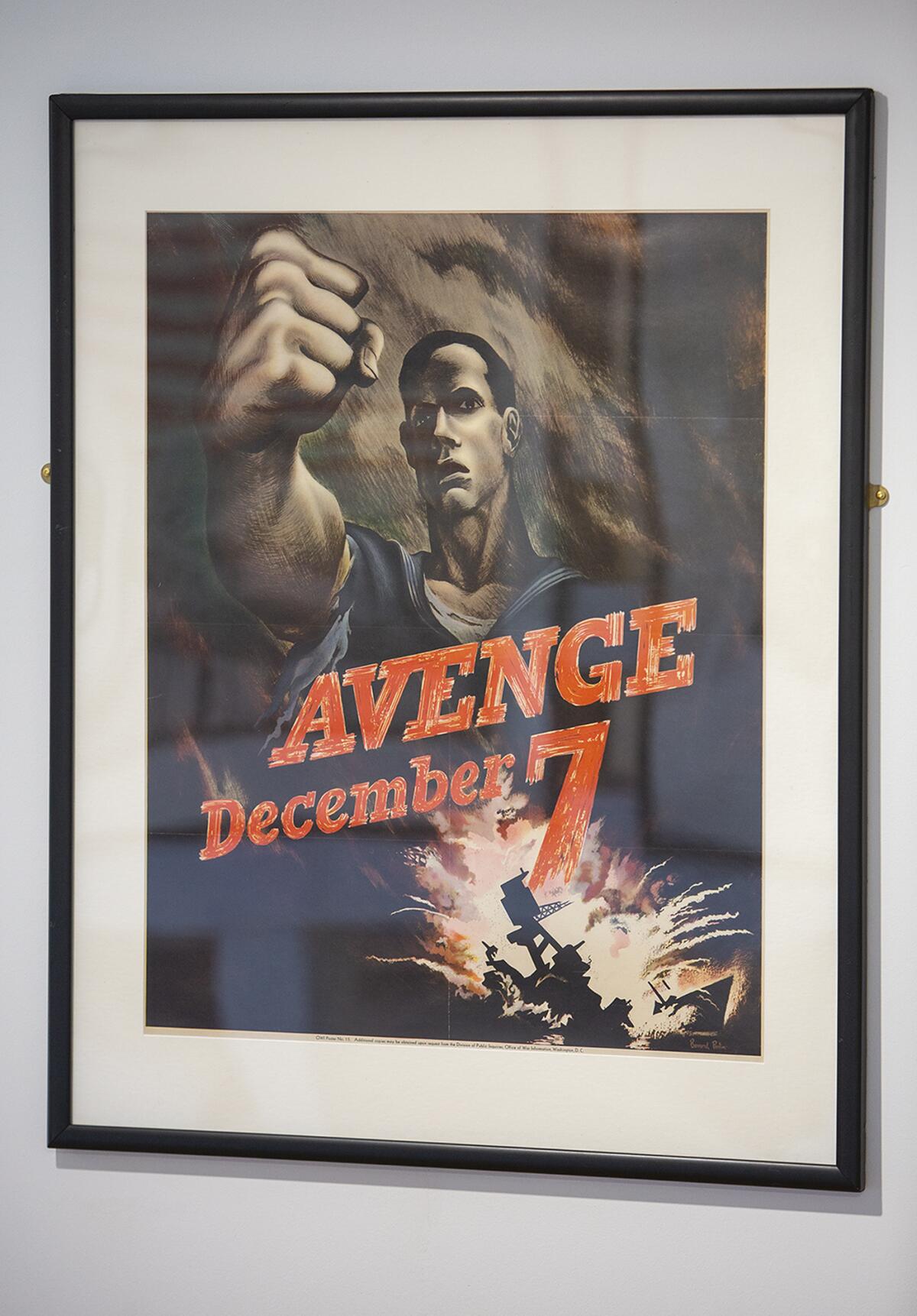 A poster in the "Fighting on the Home Front" exhibit at Heroes Hall in Costa Mesa refers to the Japanese attack on Pearl Harbor in 1941 that led to the United States entering World War II.