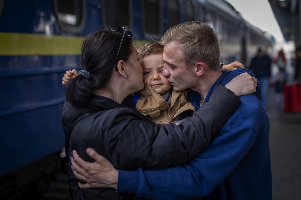 Ukrainian couple and their son reuniting
