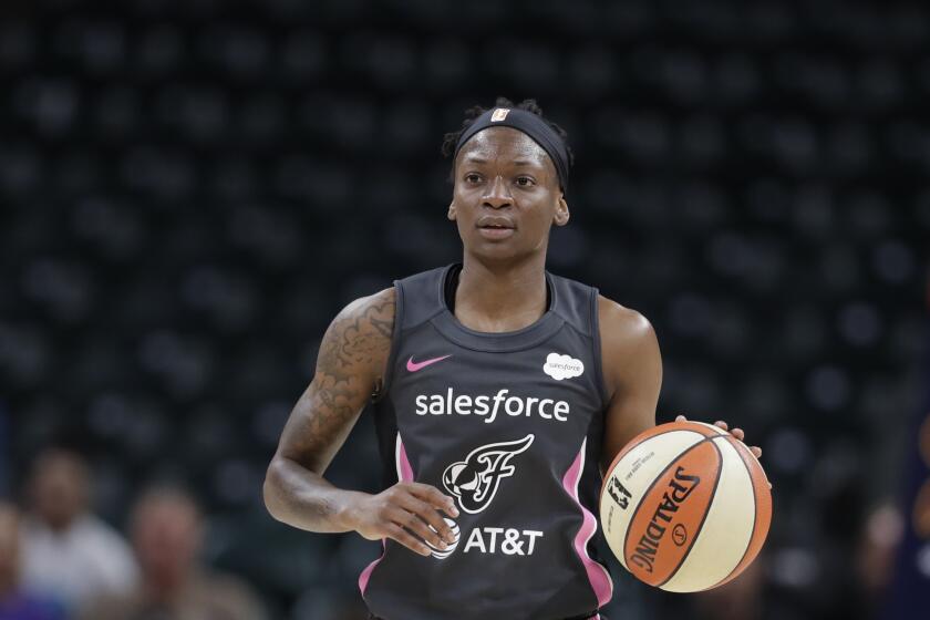 Indiana Fever's Erica Wheeler dribbles during the first half of a WNBA basketball game against the New York Liberty, Tuesday, Aug. 20, 2019, in Indianapolis. (AP Photo/Darron Cummings)