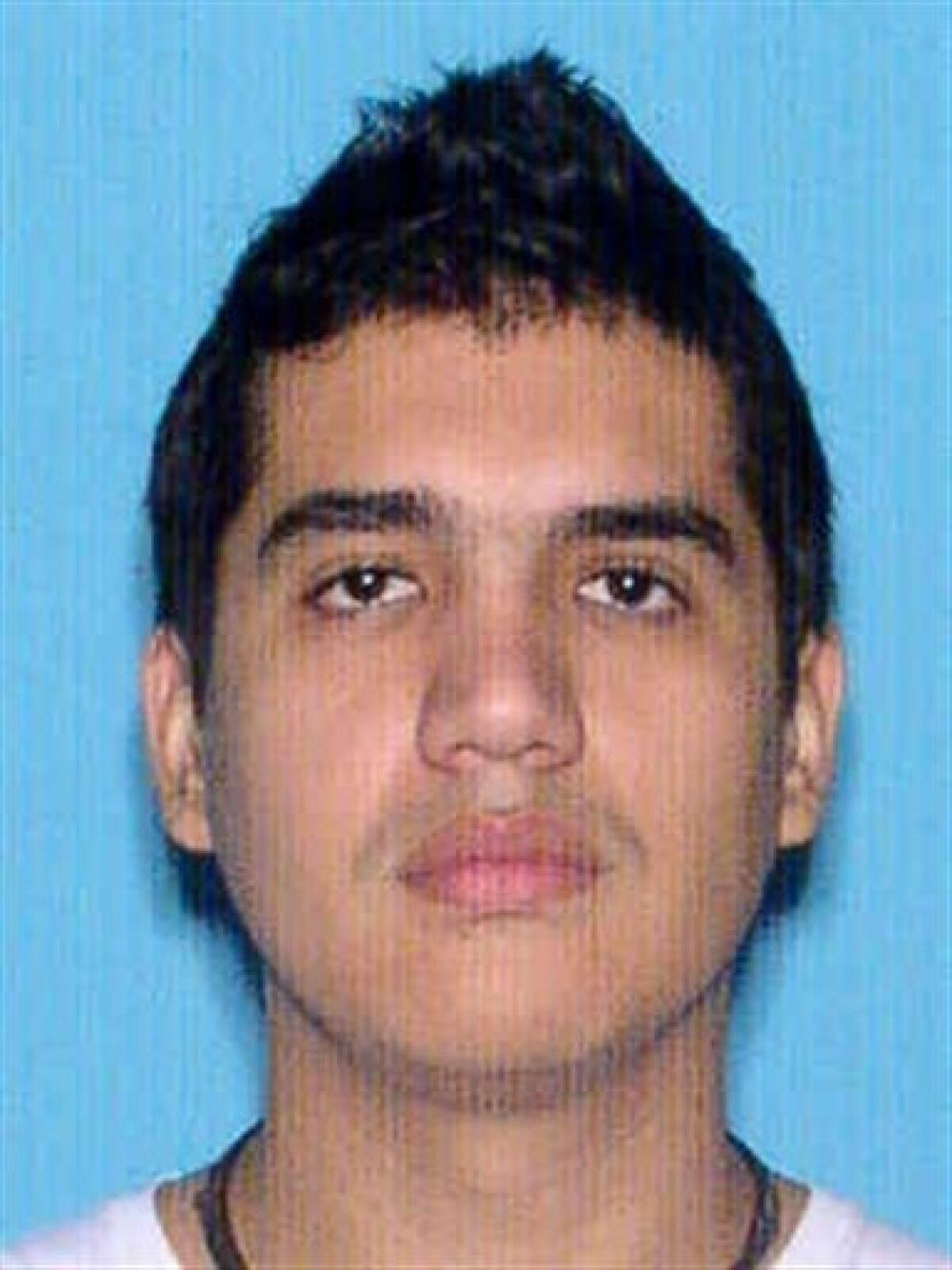 Pedro Gutierrez is seen in an undated photo provided by the Bergen County, N.J., Prosecutor's Office. Authorities say Gutierrez, 24, accused of stabbing his estranged wife to death, has waived extradition from Florida. Customs agents in Orlando detained Gutierrez as he boarded a flight for his native Colombia on Tuesday night, Oct. 4, 2011. The Bergen County Prosecutor's Office says the 24-year-old fled after stabbing Shaday Betancourth to death in a Tenafly home. Gutierrez is charged with murder. (AP Photo/Bergen County Prosecutor's Office)