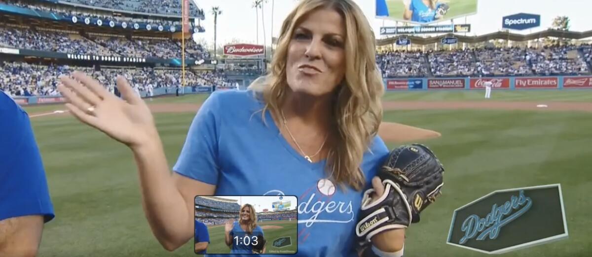 Former Hart softball standout Samantha Ford throwing out the first pitch at Dodger game in 2017 on Santa Clarita day.