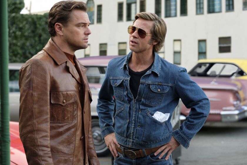 (L-R)- Leonardo DiCaprio and Brad Pitt star in "ONCE UPON TIME IN HOLLYWOOD." Credit: Andrew Cooper/Columbia Pictures