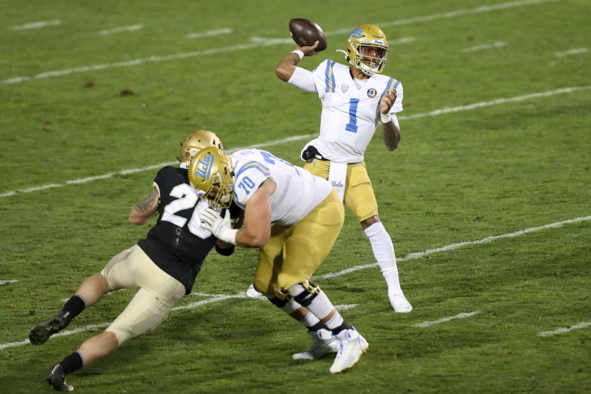 UCLA quarterback Dorian Thompson-Robinson throws against Colorado on Nov. 07, 2020, in Boulder, Colorado.