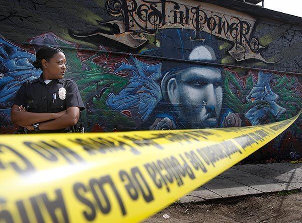 A police officer stands guard in an alley behind Melrose Avenue in the Fairfax district of Los Angeles after a fatal shooting on March 5, 2008. Matthew Itkowitz, an off-duty deputy U.S. marshal, told police he was being beaten and threatened with a gun when he drew his own weapon and fatally shot his alleged attacker, Ryan Gonzalez, 26. Prosecutors concluded that Itkowitz's account was "patently inconsistent" with video surveillance footage of the incident, but determined "there is insufficient evidence to prove that Itkowitz did not act in self-defense." See full story