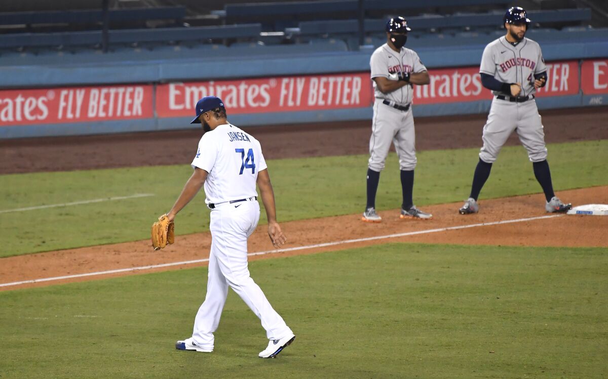 Kenley Jansen walks off the mound after a rough outing.