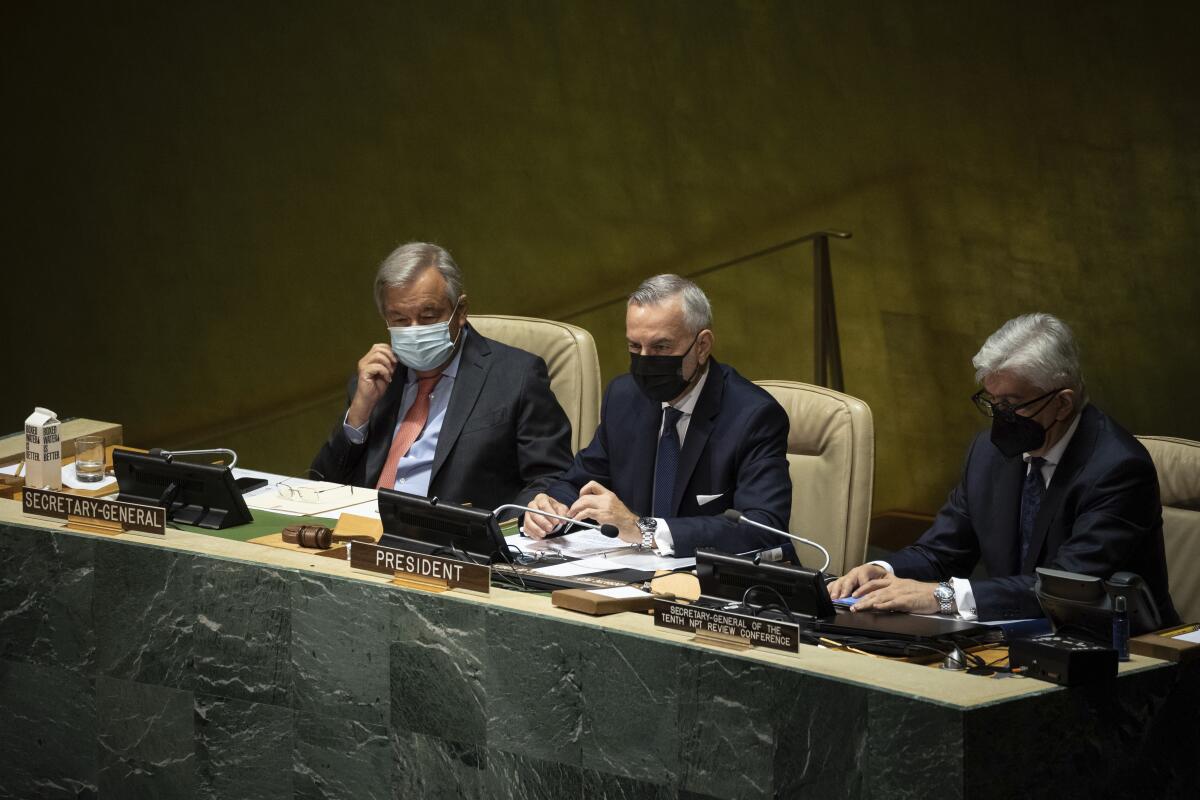 United Nations Secretary-General Antonio Guterres, left, H.E. Ambassador Gustavo Zlauvinen, center is seen during the 2022 Nuclear Non-Proliferation Treaty (NPT) review conference, in the United Nations General Assembly, Monday, Aug. 1, 2022. (AP Photo/Yuki Iwamura)