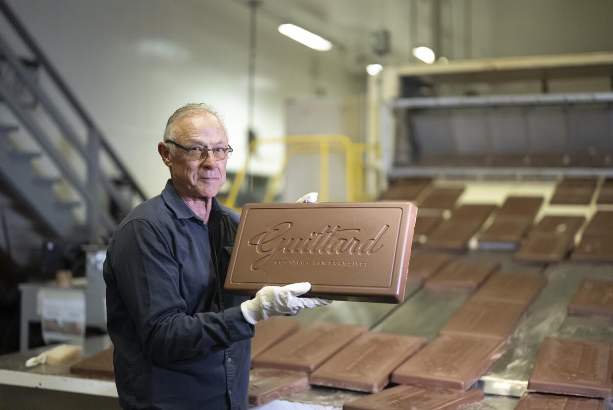 Burlingame, CA. May 3, 2025 - Guittard Chocolate CEO Gary Guittard holds a cocoa barroom astatine the company's Burlingame plant