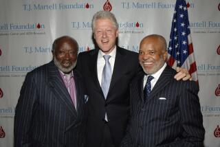 Clarence Avant, Bill Clinton and Berry Gordy at the T.J. Martell Foundation's 31st Annual Awards Gala at the Marriott Marquis in New York City (Photo by L. Busacca/WireImage for TJ Martell Foundation)
