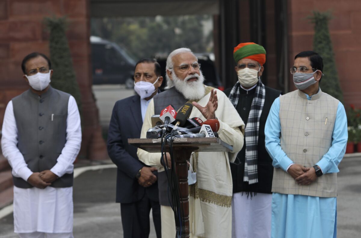 Indian Prime Minister Narendra Modi addresses the media