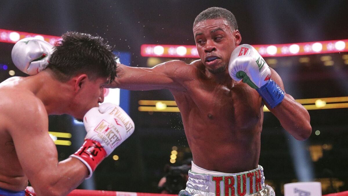 Errol Spence, left, defeated Mikey Garcia at AT&T Stadium on March 16 in a pay per view that topped 360,000 purchases.