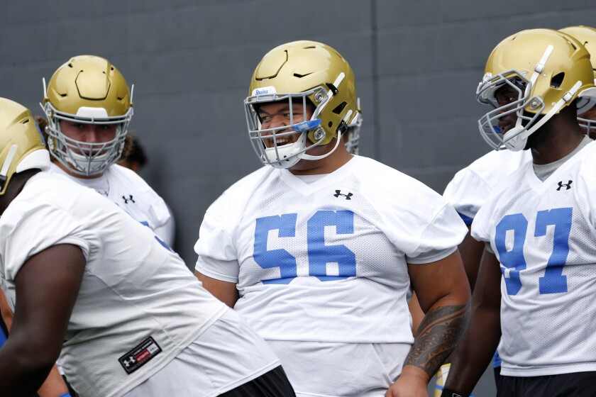 UCLA defensive lineman Atonio Mafi (56) looks noticeably slimmer and quicker at fall training camp than during spring practice.