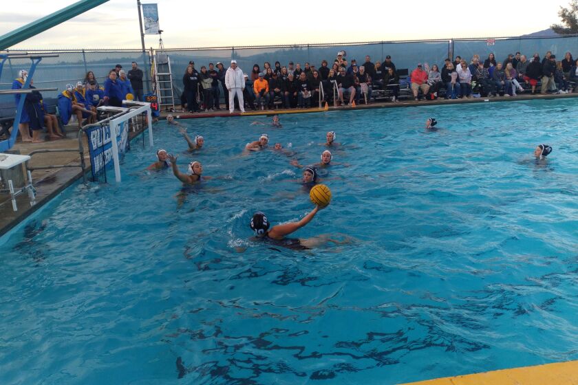 Ramona High water polo player Lola Buscho takes a shot against San Pasqual at the Feb. 2 game. 