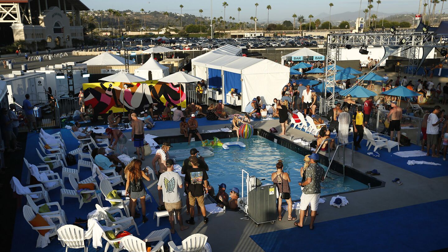 Guests relax in a “Vegas-style” pool club at KAABOO Del Mar on Saturday, September 15, 2018. (Photo by K.C. Alfred/San Diego Union-Tribune)