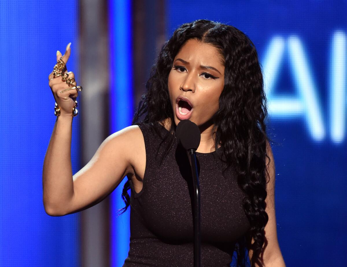 Nicki Minaj accepts the award for best female hip-hop artist during the BET Awards in June.