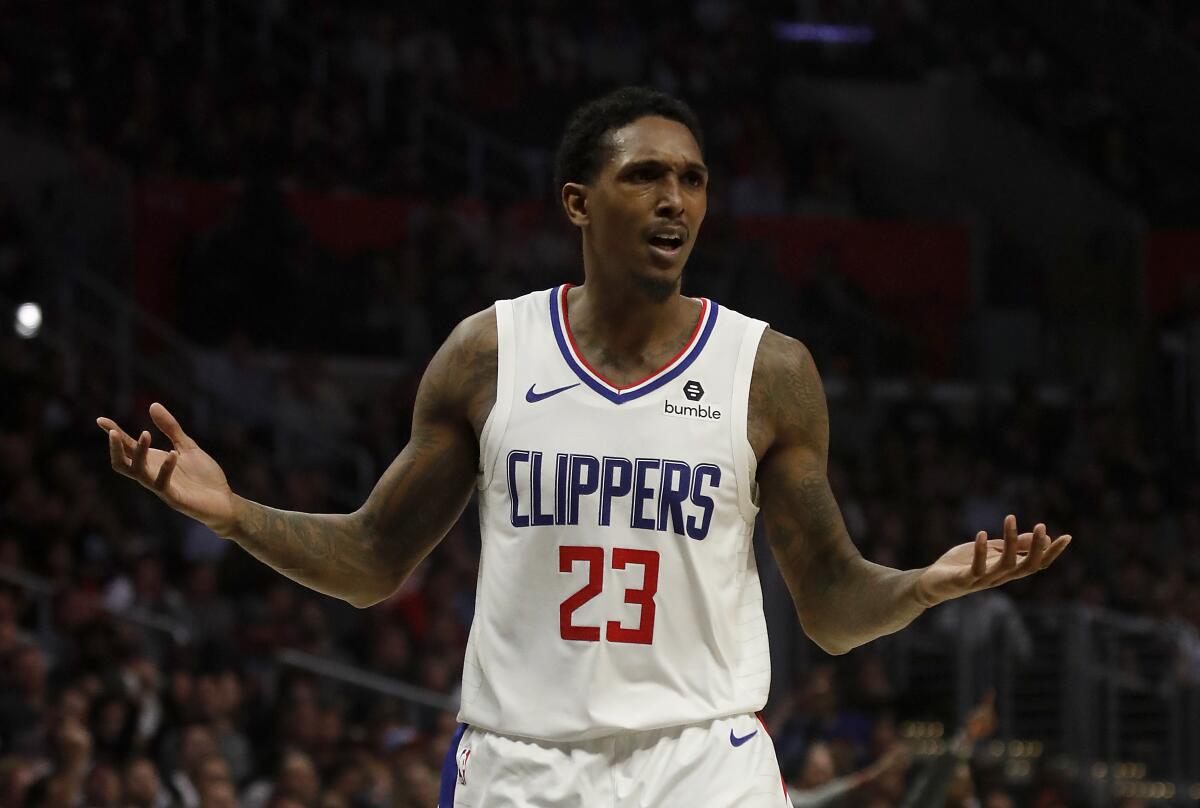Clippers guard Lou Williams reacts after being called for an offensive foul against the Bucks during the fourth quarter of a game Nov. 6 at Staples Center.