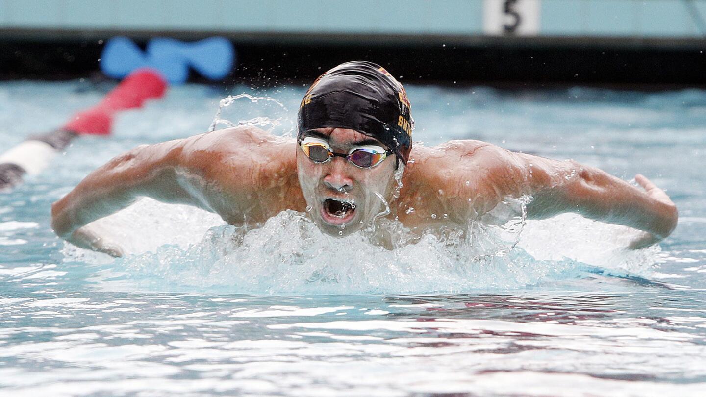 La Canada's Danny Syrkin swims and wins the 100 butterfly in the 2018 All City Meet La Canada High School on Friday, March 16, 2018. This is the first time the high schools in La Canada Flintridge, including Flintridge Sacred Heart Academy, Flintridge Preparatory School, La Canada High School, and St. Francis High School have competed against each other in a meet.
